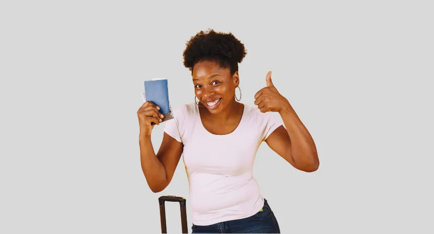 Happy woman holding passport