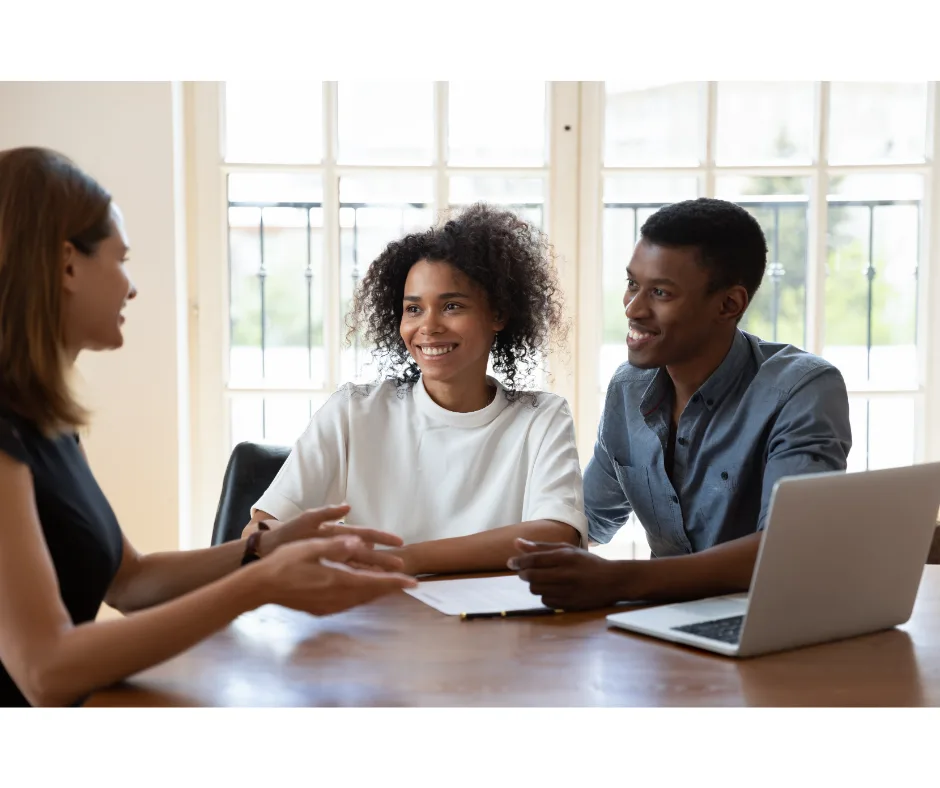 Migration agent meeting with clients