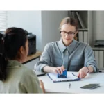 Migration agent reviewing skilled visa documents.