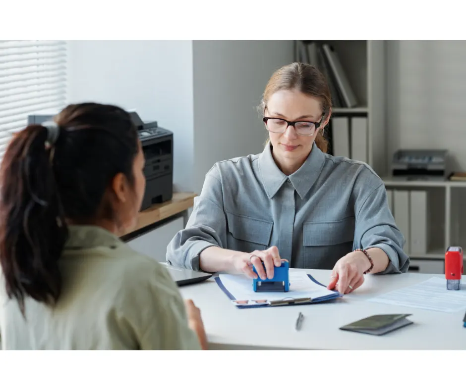 Migration agent reviewing skilled visa documents.